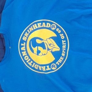 Blue size xl t-shirt depicting a traditional, non-racist skinhead.